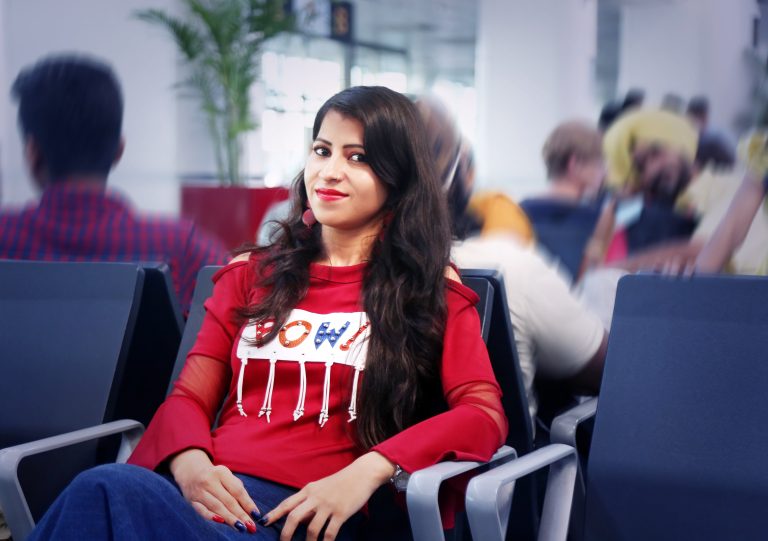 Women waiting her flight at airport